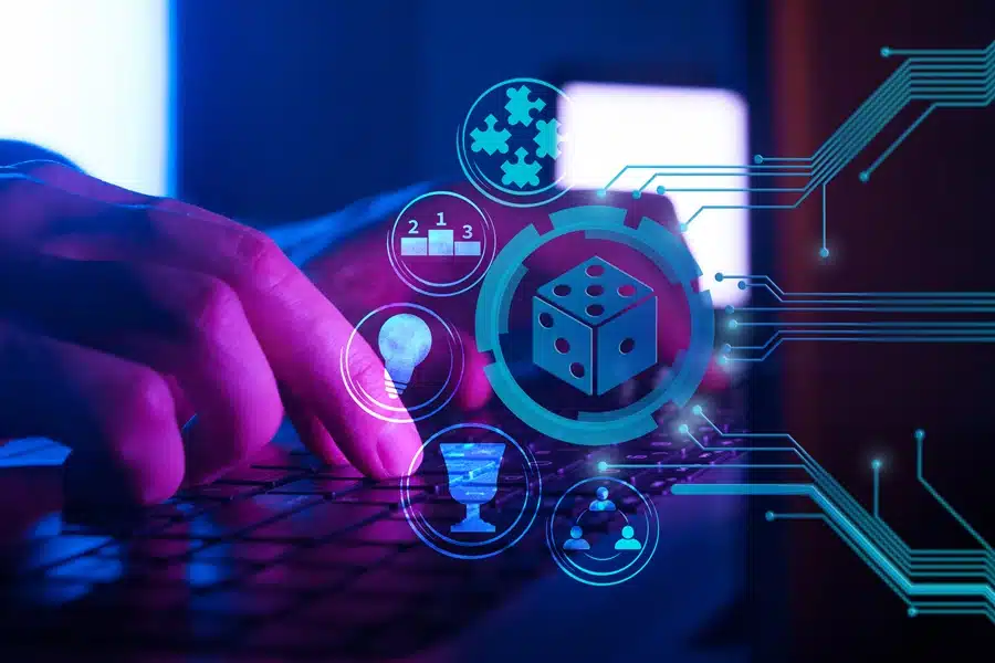 Close-up of hands typing on a keyboard with futuristic icons of dice, puzzles, trophies, and lightbulbs, symbolizing game prototyping and idea testing in development.